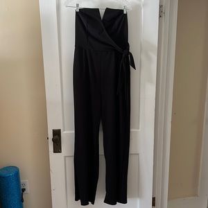 NWT Black sleeveless romper. Large
